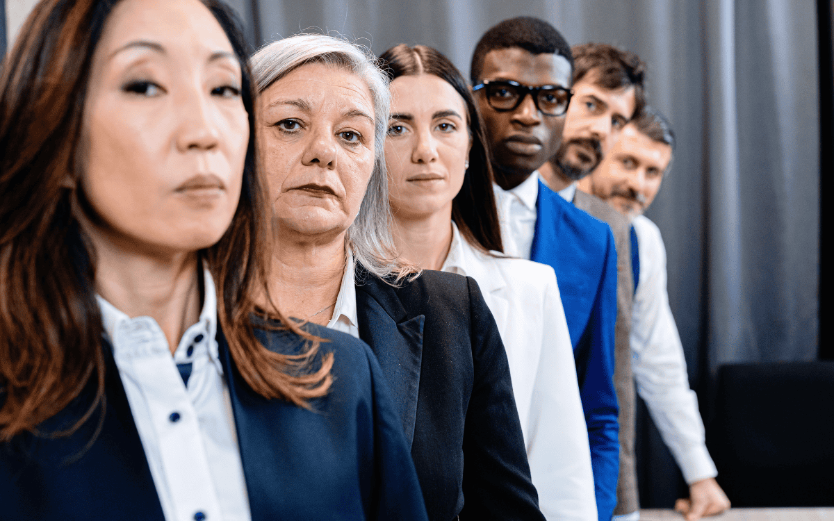 Portrait of multigenerational working team with multiracial colleagues in the office